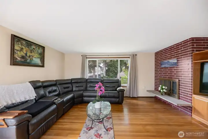 Large windows overlooking the backyard