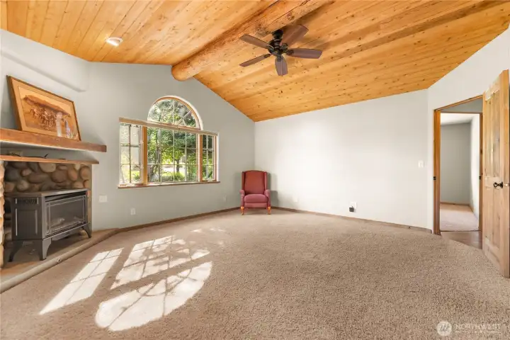 Primary Bedroom with propane fireplace.