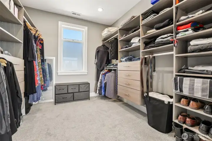 Primary bedroom walk-in closet