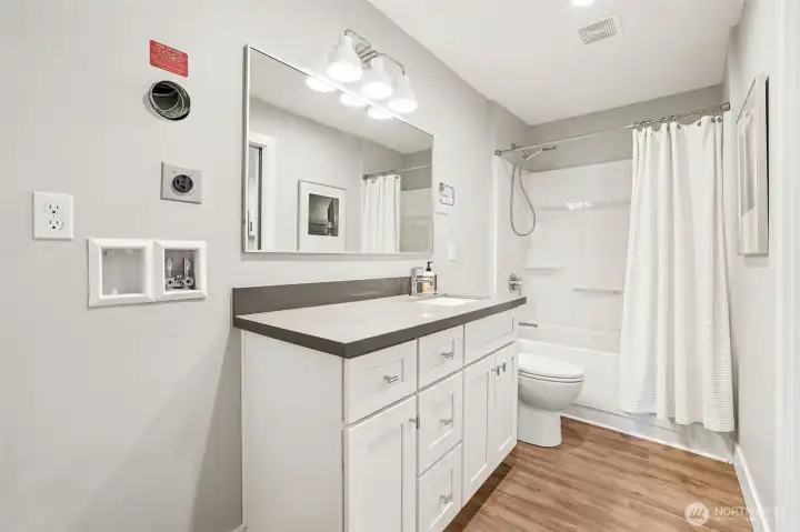 Lower level full bathroom with washer/dryer hookups