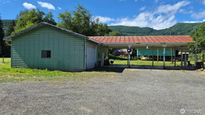 Shop and covered parking attached to house