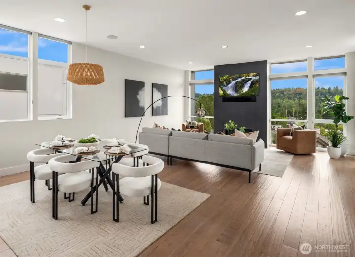 The southwest exposure pours in the natural light all year long. Overhead built-in speakers provide the soundtrack for your daily living.