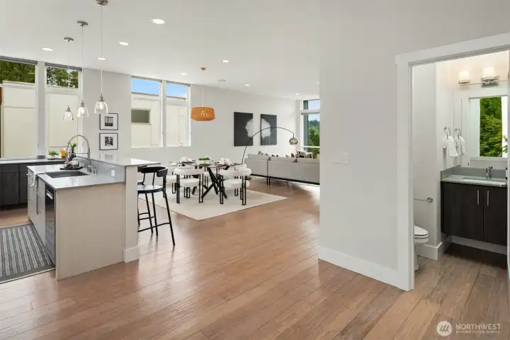 Discreetely located is the main floor powder room with floating vanity.