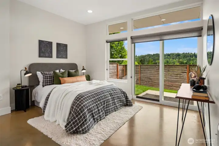 Bedroom three (of four bedrooms) has it's own private patio and can handle the largest of bedroom furniture.