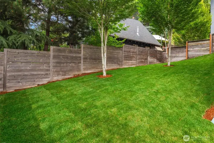 The only home in the enclave with a yard like this makes this one special.