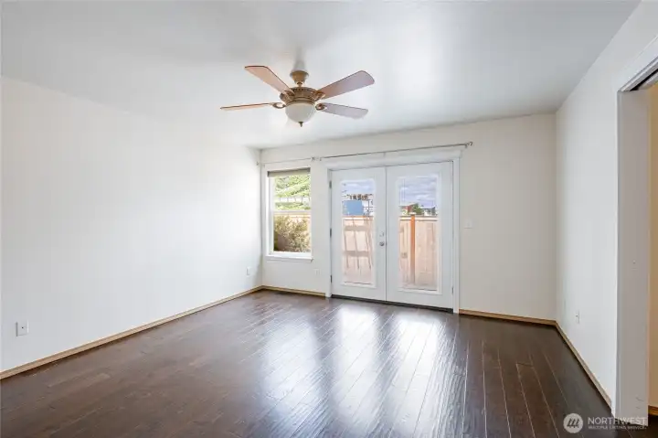 primary bd with french door to backyard primary bd with french door to backyard