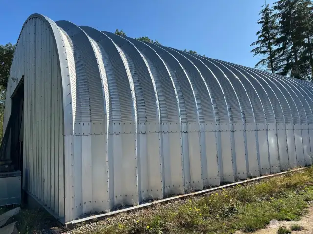 View of side of metal building.