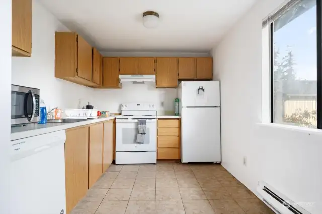 Light and bright kitchen with plenty of storage and prep space