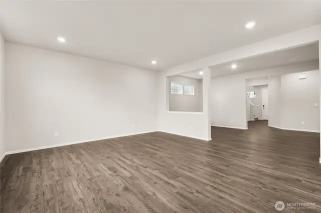 Living Room, Dining Room, and Entry. Photos of previously built home of same floorplan. Colors, Specifications, and Options may vary on actual home.