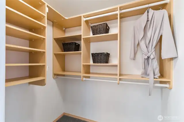 Walk-in closet in primary bedroom.