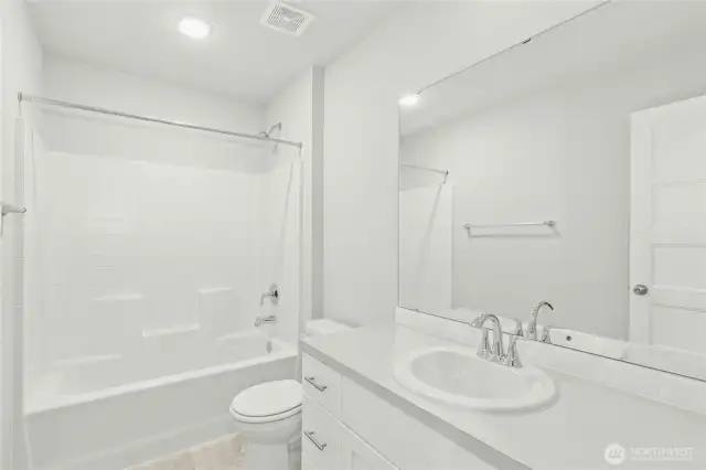 Photos are of Homesite 24 at Star Lake. Colors and features of actual home may vary.