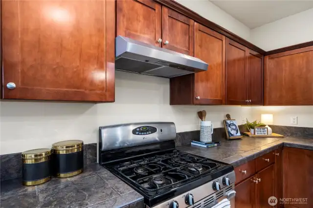 sprawling kitchen/dining area flows seamlessly out to the back patio and into the large living room!
