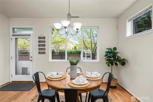 sprawling kitchen/dining area flows seamlessly out to the back patio and into the large living room!