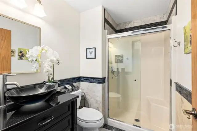 Main level bath with Walkin shower and bowl sink