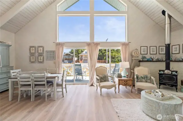 Light and bright open concept living with Vinyl plank flooring throughout