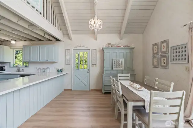 View to dining area, beautiful kitchen peninsula with seating