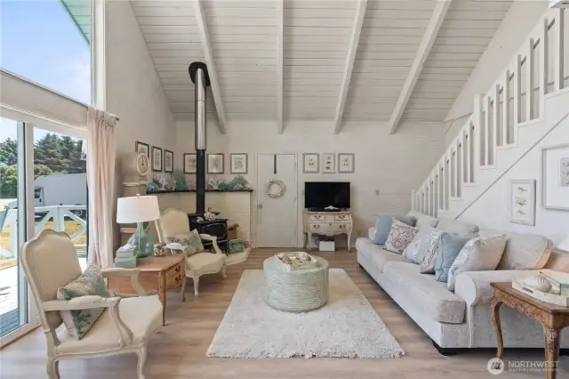 Closer look at living area with wood burning fireplace