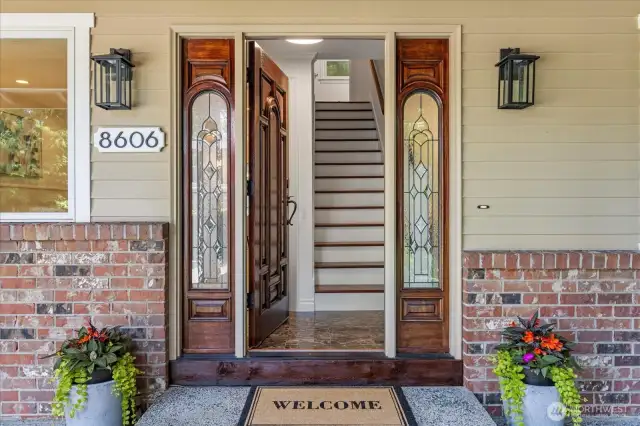 Freshly restained front door with side lights welcome you into this traditional 2 story home.