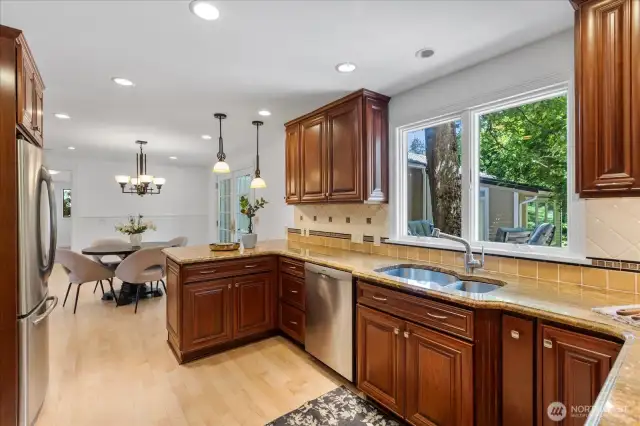 Kitchen, eating area and family room hardwoods have just been refinished.
