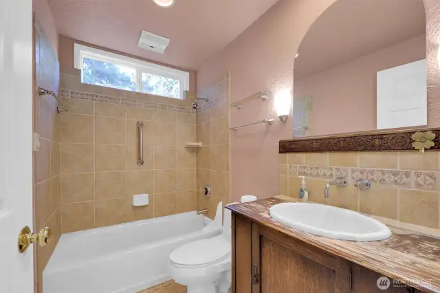 Full bathroom located upstairs.