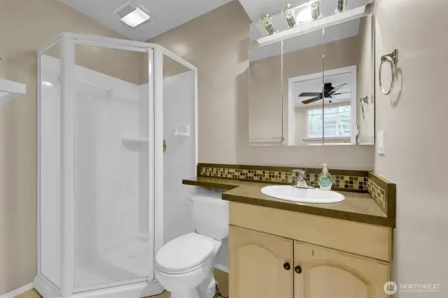 Bathroom located off of bedroom #4 downstairs.