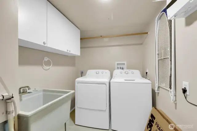 Utility room located downstairs.