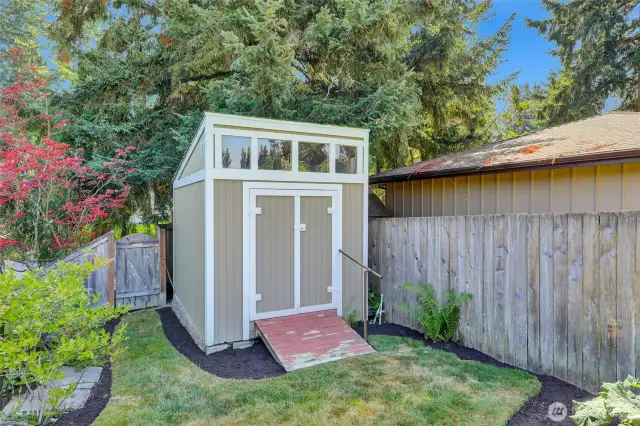 Cute shed for storage.