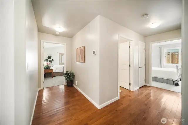 Just past the kitchen, the wide hallway to the left guides you into the comfort of your primary suite.