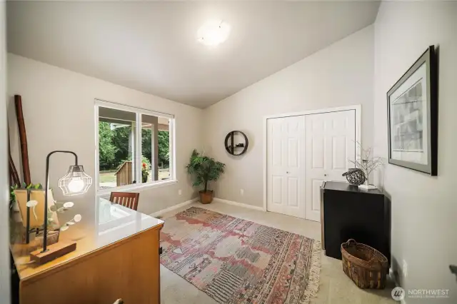 Large window overlooks front patio.