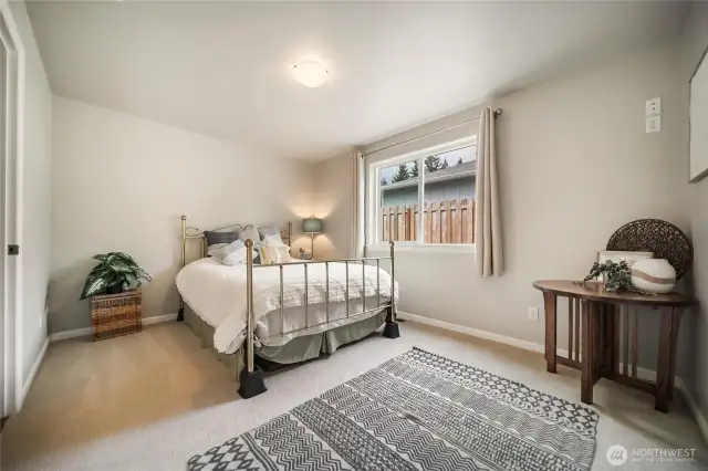 Guest bedroom is inviting.