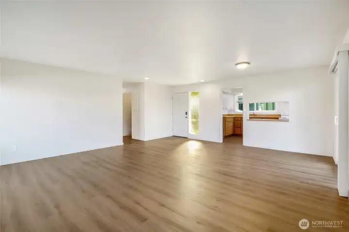 Another view of the living room and dining area.