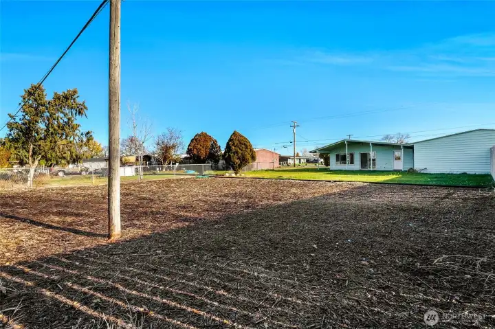 Look at all this room to add garden beds or trees!  In either case, it's low maintenance!