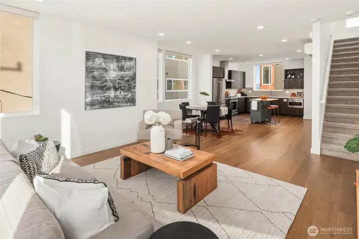 Huge open living, dining, and kitchen with dedicated space for everything!