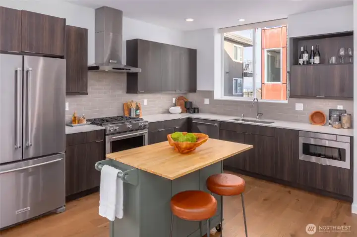 Huge open living, dining, and kitchen with dedicated space for everything!