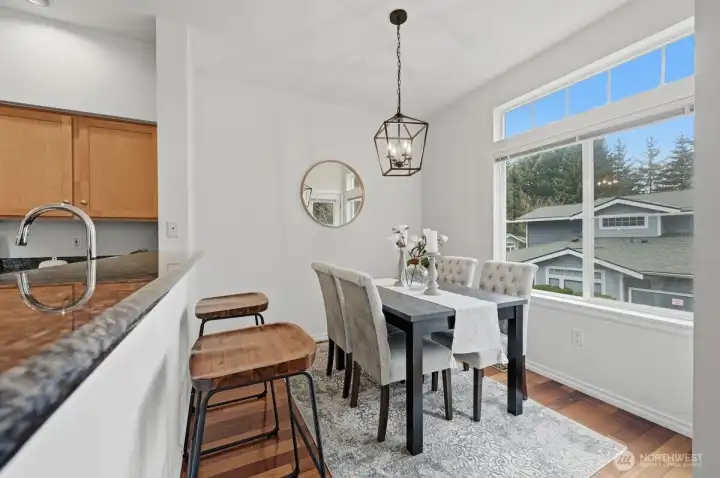 Dining room and breakfast bar, overlooking kitchen