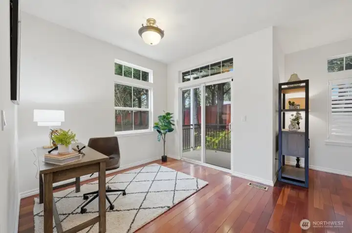 Flex space or 2nd dining room that leads out to 2nd of two private patios on main level
