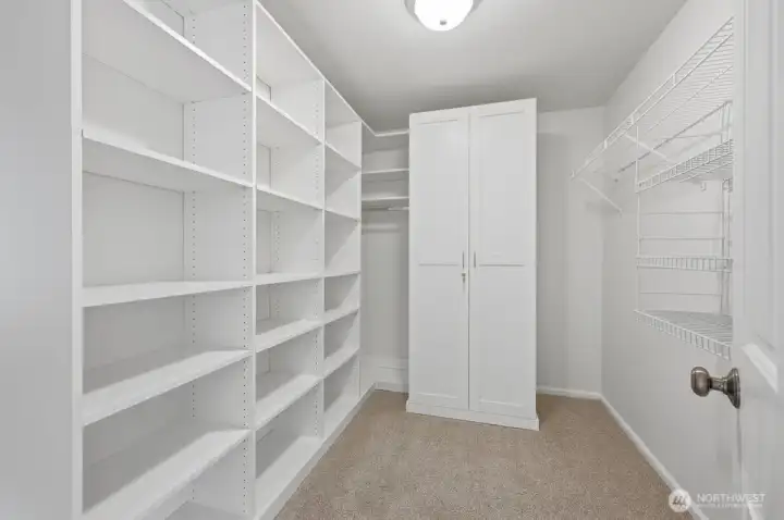 Walk-in closet off primary bedroom