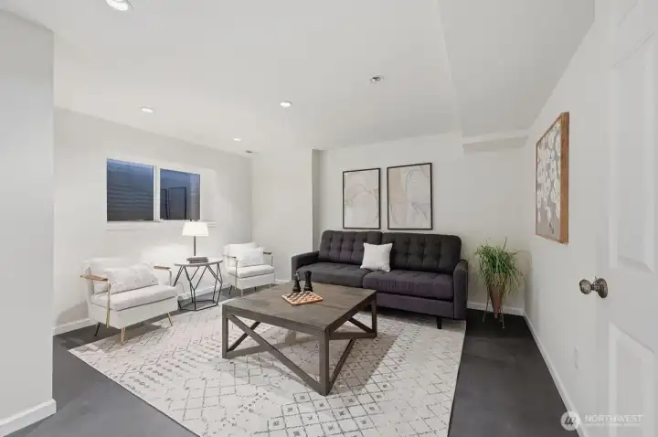 Basement level flex room--Perfect for a media room, gym or at home work space