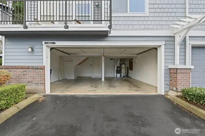 Spacious 22 foot wide, 2-car garage. EV outlet for vehicle charging. Direct access to home.