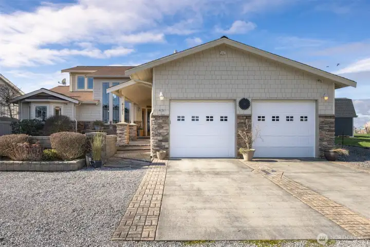 4121 Saltspring Dr is an exceptional home that offers waterfront living along with thoughtful & gracious design