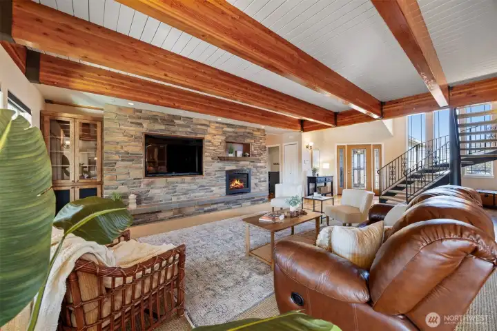 Note the recessed TV niche (TV stays) along with the bookcase storage & cozy fireplace