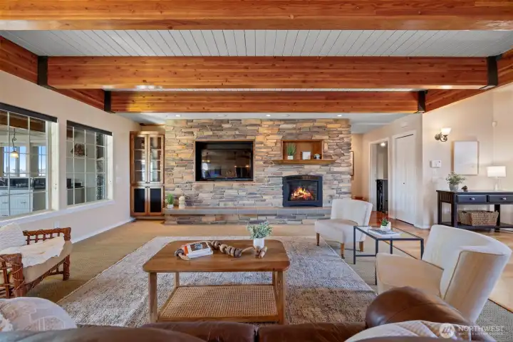 The windows on the left bring in abundant light from a lovely four season sunroom