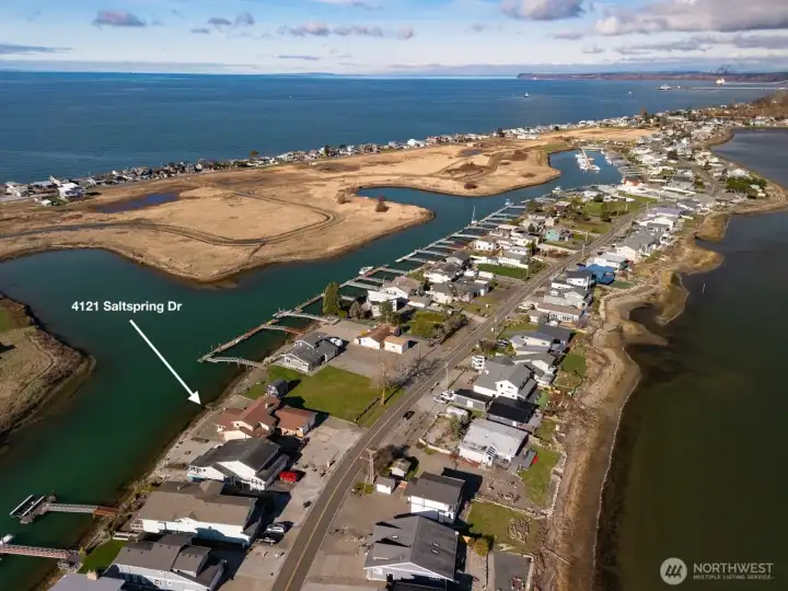 The marina is located at the end of the canal and the golf course, pool and clubhouse are just 9 minutes away