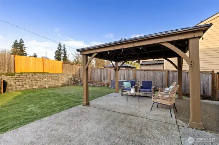 Terraced garden space along fence line