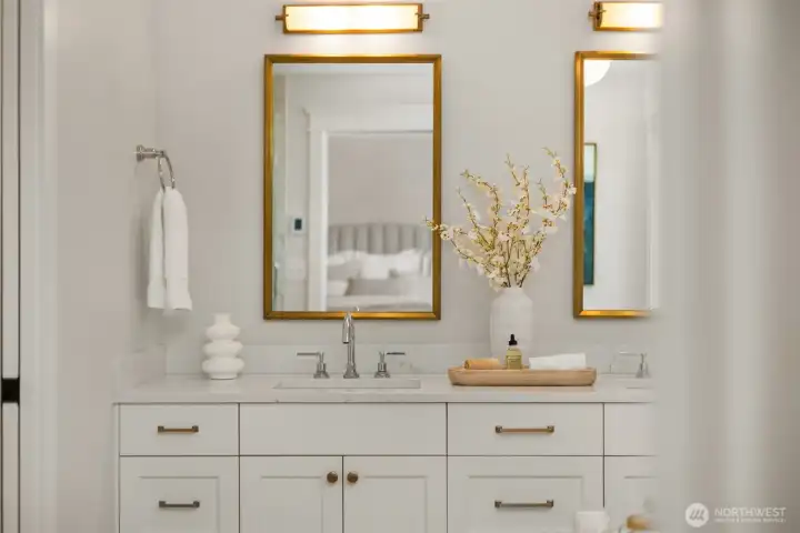 Bathroom Lighting by Visual Comfort, Mirrors from RH, Signature Hardware and Kohler Fixtures. Calacatta tile and Misterio Quartz.