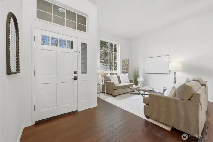 Bright entryway with fresh pain throughout