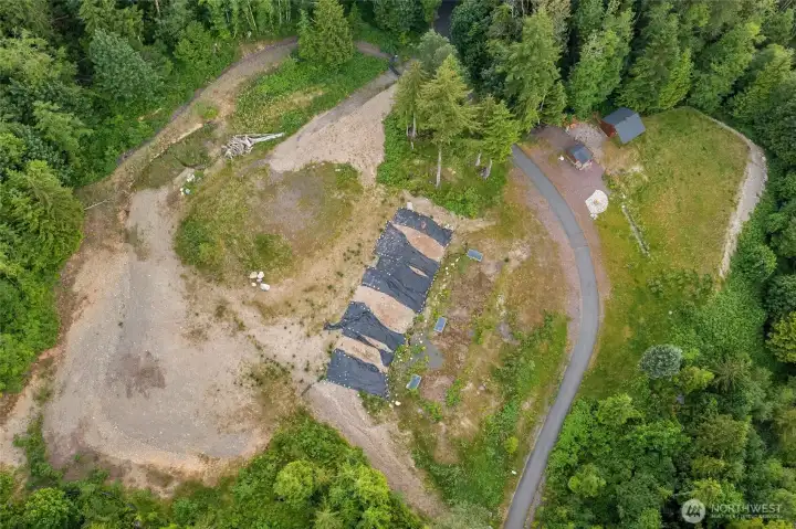 The build site above has been graded and cleared.