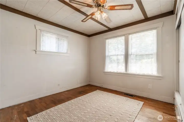 Downstairs bedroom across from bathroom with soaking tub.