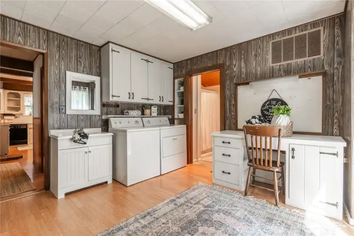 Ample laundry and mudroom space or project room.