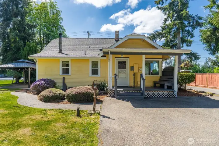 Back porch, room for parking, and well designed walkways around the home.